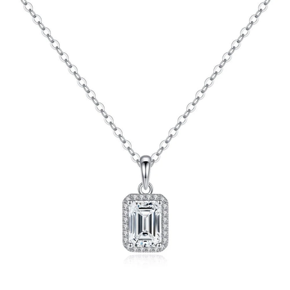 Emerald cut moissanite halo pendant necklace with pavé accents in rhodium-plated sterling silver top view-Novelle Vow