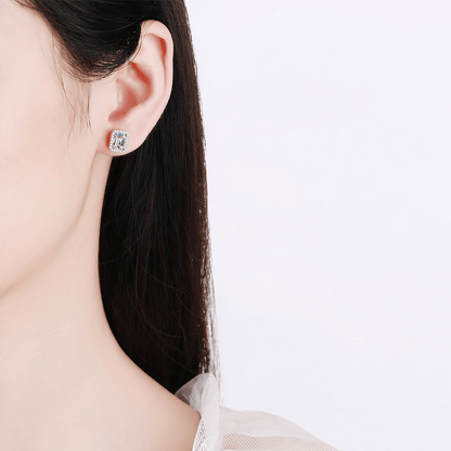 Emerald Cut Moissanite Stud Earrings Worn on Ear in White Gold - Novelle Vow