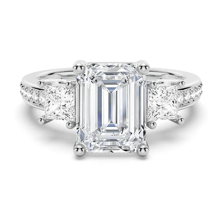 Emerald Cut Three Stone Moissanite Engagement Ring with Pave Band in White Gold - Novelle Vow