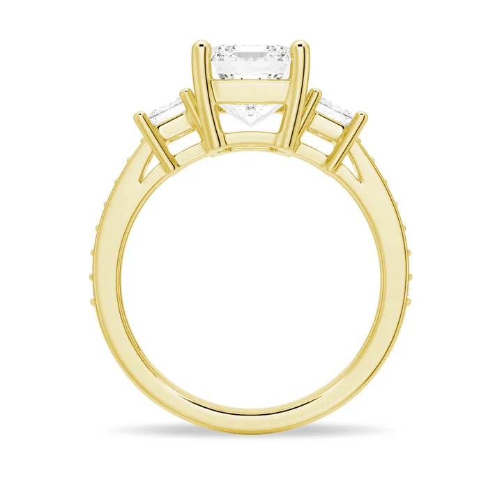 Profile view of Emerald Cut Three Stone Moissanite Engagement Ring with Pave Band in Yellow Gold 