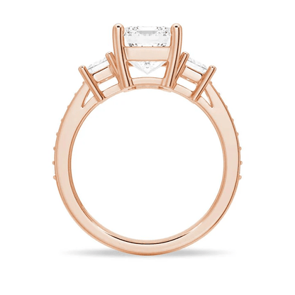 Profile view of Emerald Cut Three Stone Moissanite Engagement Ring with Pave Band in Rose Gold