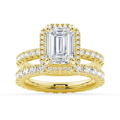 Yellow gold emerald cut moissanite bridal set with halo engagement ring and matching pave wedding band
