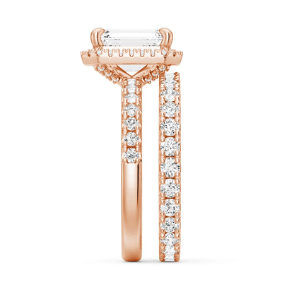 Rose gold emerald cut moissanite bridal set side profile showing stacked halo basket and pave band