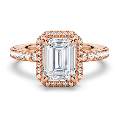 Rose gold emerald cut moissanite engagement ring top view with pave halo and pave band