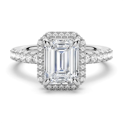 White gold emerald cut moissanite engagement ring top view with pave halo and pave band