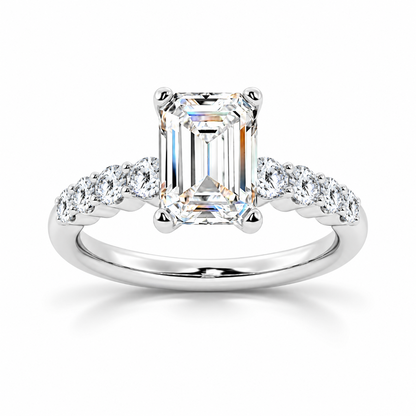 White gold emerald cut moissanite engagement ring top view with shared-prong round side stones-Novelle Vow