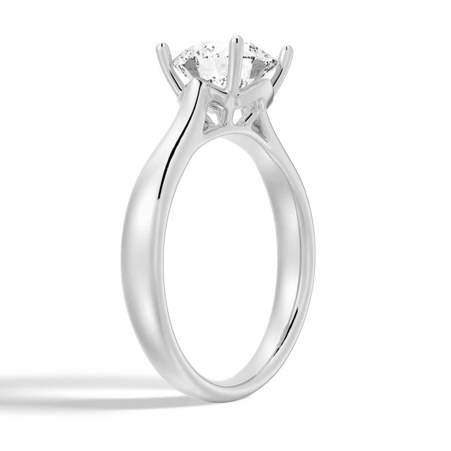 Classic Four-Prong Round Moissanite Solitaire Engagement Ring