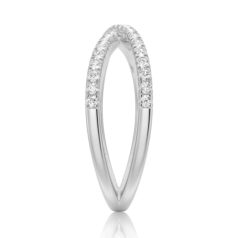 Edge view showing French pave moissanite crossover band structure in white gold color