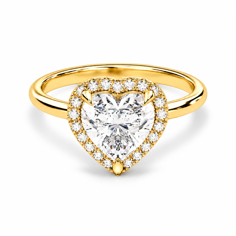 Yellow gold heart shaped moissanite engagement ring top view with round moissanite halo