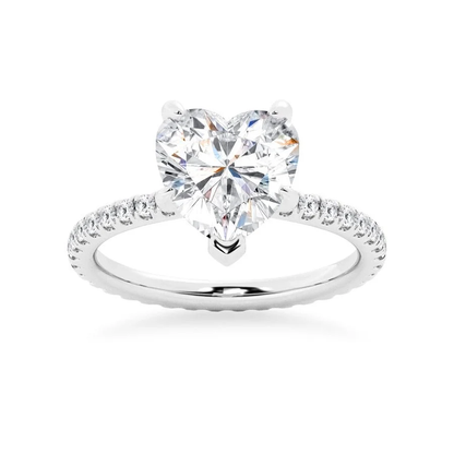 White gold heart shaped moissanite engagement ring side profile perspective view showing three prong basket-Novelle Vow