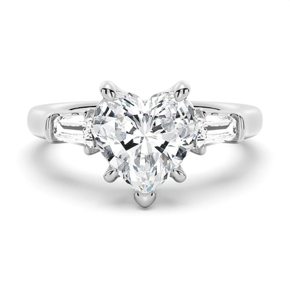 White gold heart shaped moissanite engagement ring top view with tapered baguette side stones-Novelle Vow