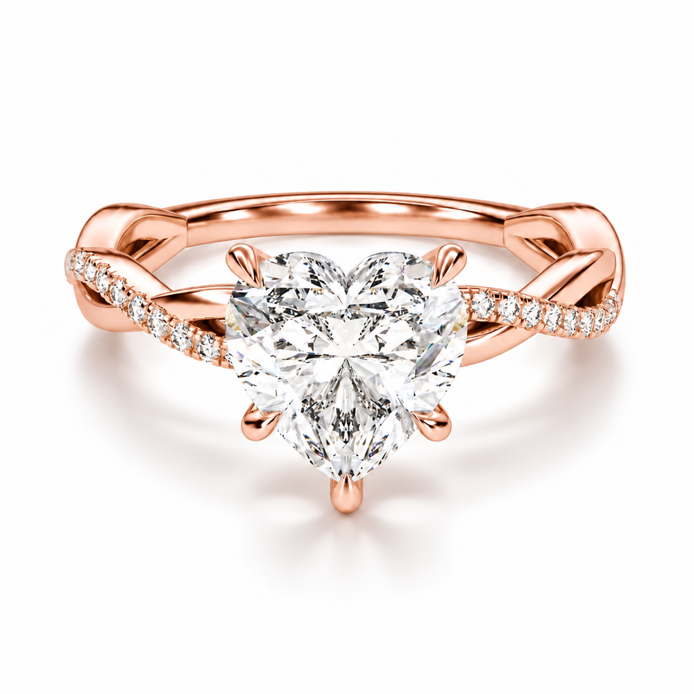 Rose gold heart shaped moissanite engagement ring top view with twisted pave moissanite band
