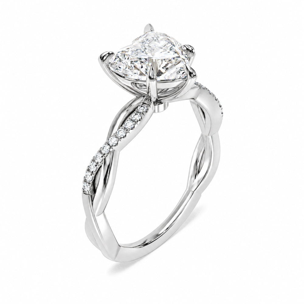 White gold heart shaped moissanite engagement ring 3/4 side low angle perspective view showing basket