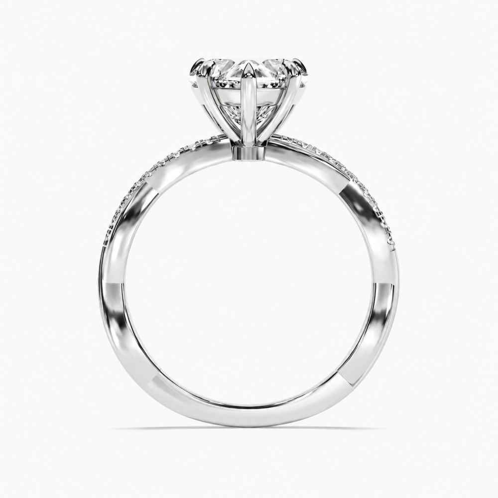 White gold heart shaped moissanite engagement ring direct side profile view showing twisted band