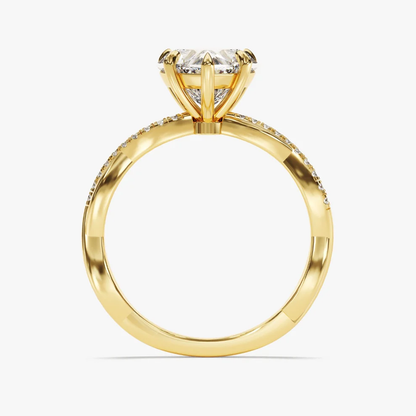 Yellow gold heart shaped moissanite engagement ring top view with twisted pave moissanite band