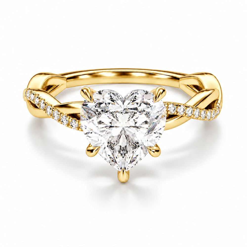 Yellow gold heart shaped moissanite engagement ring top view with twisted pave moissanite band