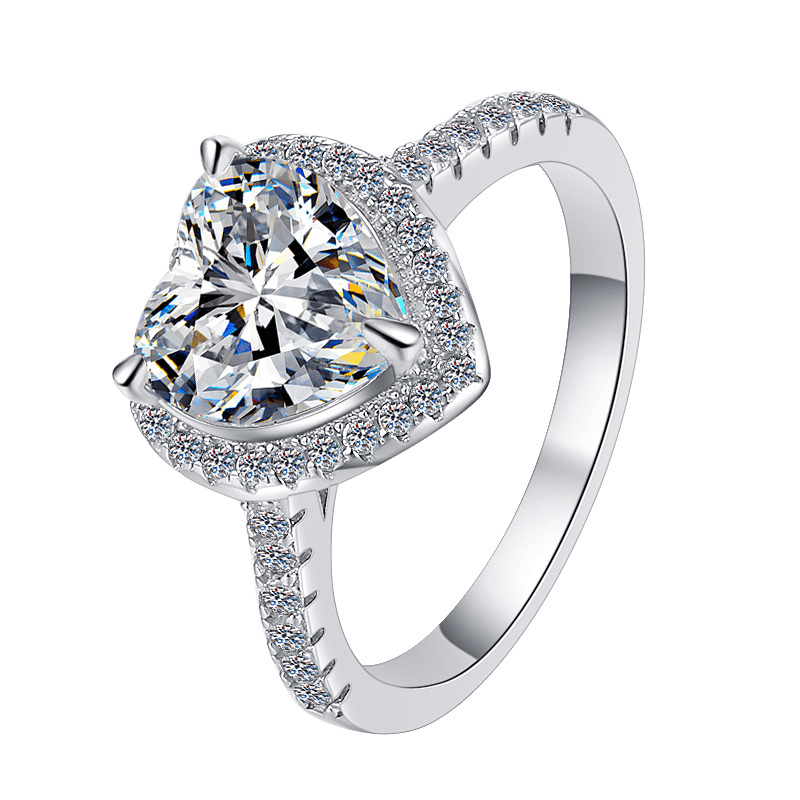 Angled profile view of Heart Shaped Moissanite Halo Engagement Ring with Pave Band in White Gold - Novelle Vow