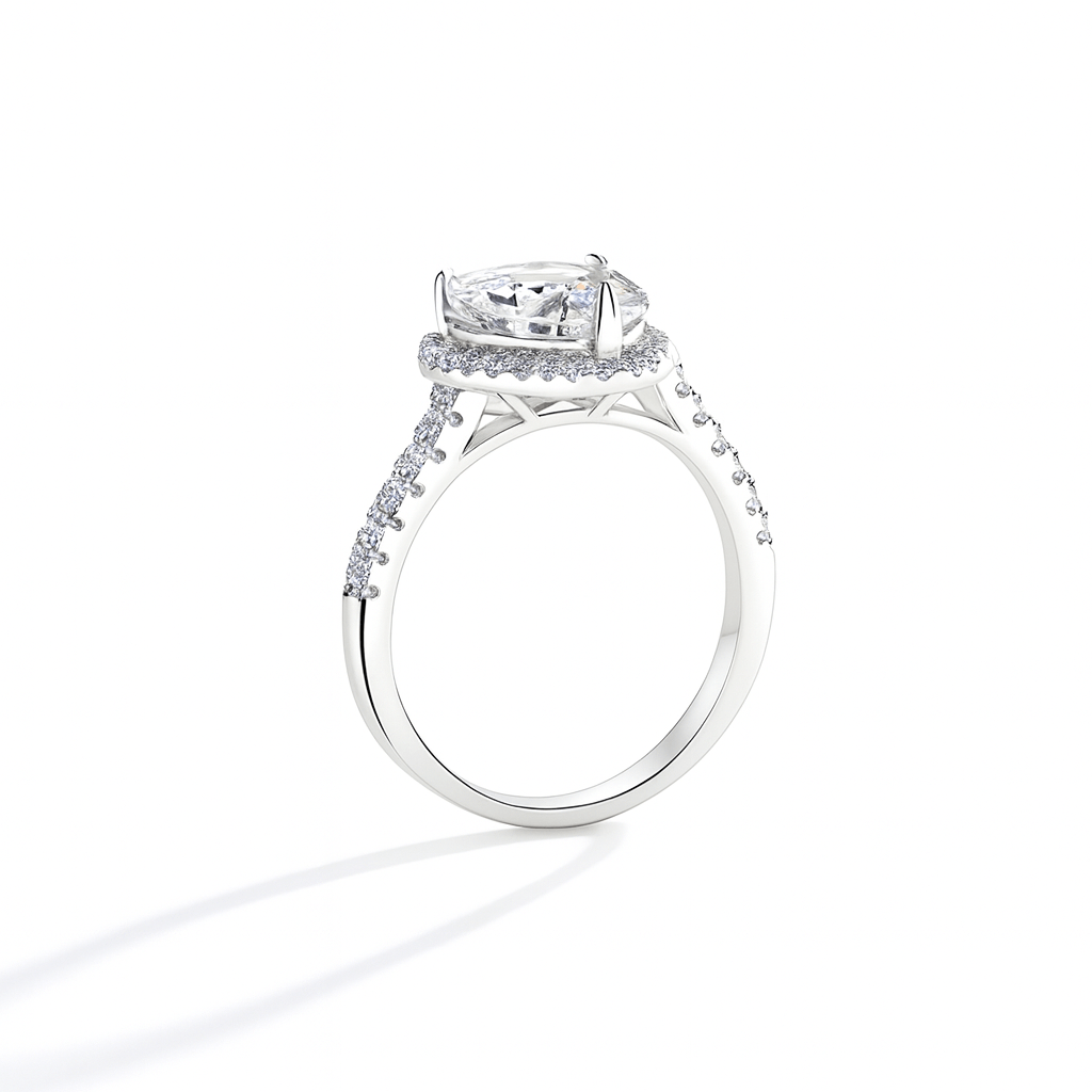 Profile view of Heart Shaped Moissanite Halo Engagement Ring with Pave Band in White Gold - Novelle Vow