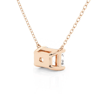 Angled profile view of Horizontal East-West Set Emerald Cut Moissanite Solitaire Necklace in Rose Gold