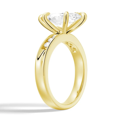 Yellow gold marquise cut moissanite engagement ring low angle perspective view showing channel band