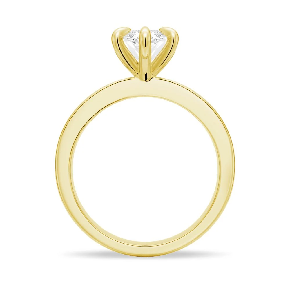 Yellow gold marquise cut moissanite engagement ring direct side profile view showing head crown
