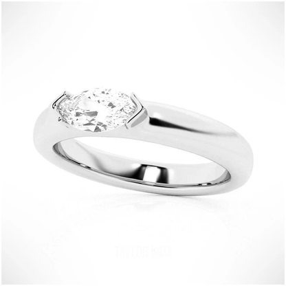 White gold marquise cut moissanite east-west half bezel solitaire ring 3/4 side view