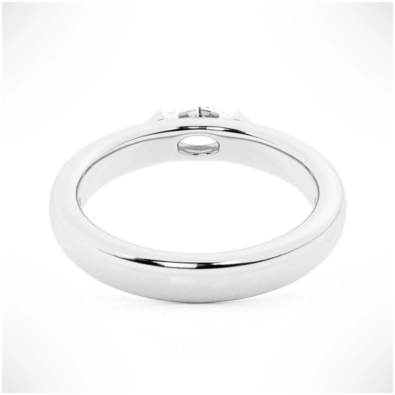 White gold marquise cut moissanite east-west half bezel solitaire ring direct side profile view showing under-gallery hole