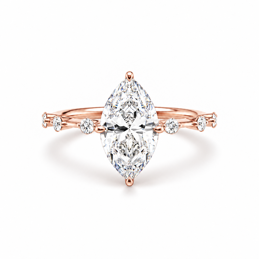 Rose gold marquise cut moissanite engagement ring top view with station accent shank