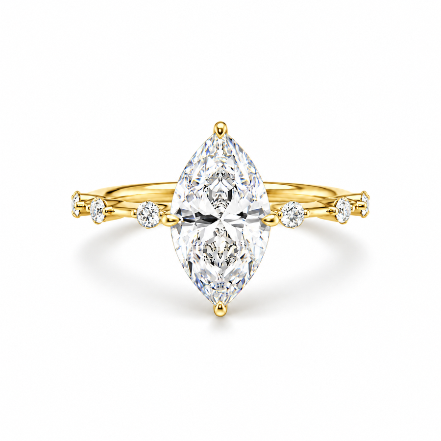 Yellow gold marquise cut moissanite engagement ring top view with station accent shank