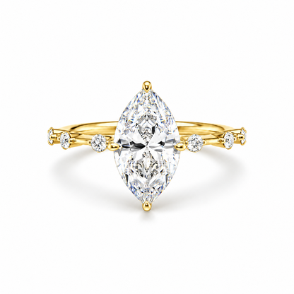 Yellow gold marquise cut moissanite engagement ring top view with station accent shank