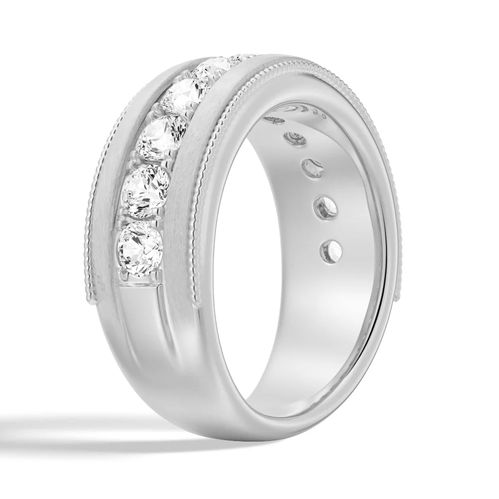 Three-quarter perspective view of men's 9mm moissanite wedding ring with milgrain details in white gold color