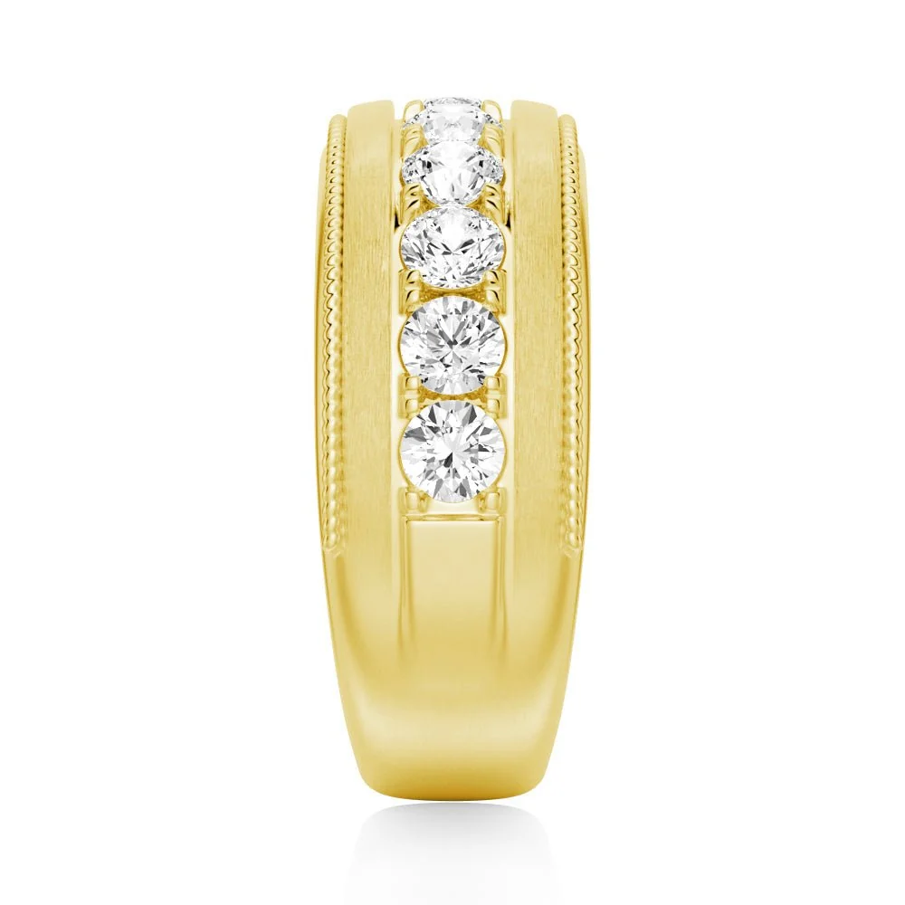 Top vertical view of men's 9mm channel bezel round moissanite wedding band in yellow gold color