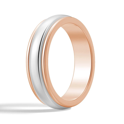 Perspective angle view of 6mm rose gold and white gold two-tone dome wedding band