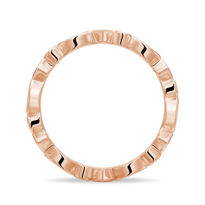 Side profile view of multi-shape bezel moissanite eternity band in rose gold color