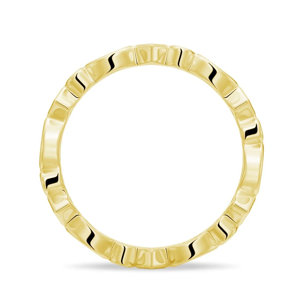 Side profile view of multi-shape bezel moissanite eternity band in yellow gold color