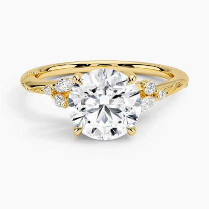 Front view of yellow gold round moissanite engagement ring featuring marquise side stones