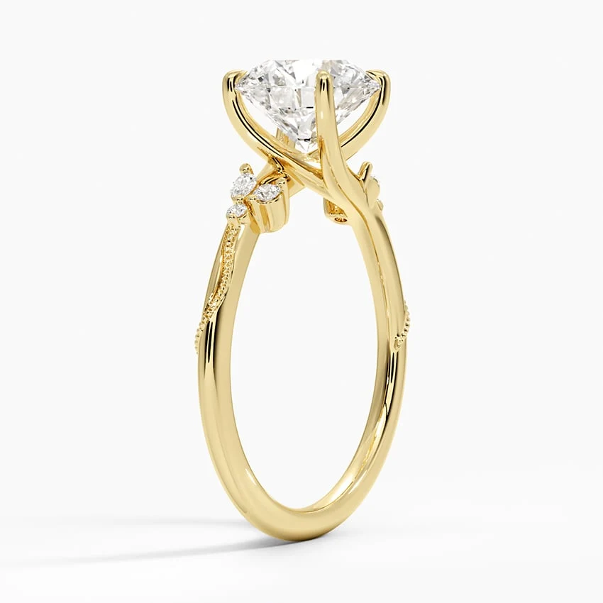 Profile view showing 1.8mm delicate band and prong setting on yellow gold moissanite ring