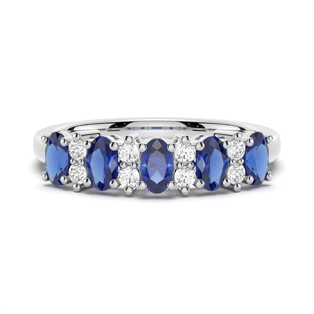 NOVELLE VOW front view of 3x5mm oval blue sapphire and round white sapphire alternating wedding band