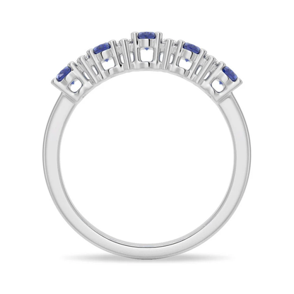 Full ring profile showing shared prong basket setting for blue and white sapphires