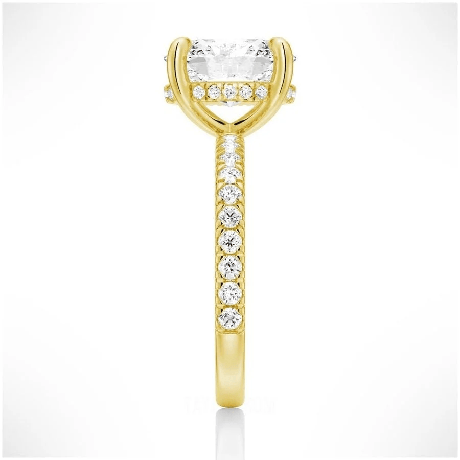 Side profile view of Oval Cut Moissanite Engagement Ring with Hidden Halo & Pavé Band and 4 Prong Setting in Yellow Gold