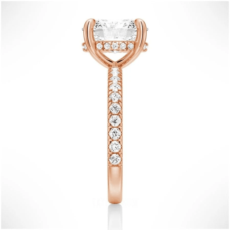 Side profile view of Oval Cut Moissanite Engagement Ring with Hidden Halo & Pavé Band and 4 Prong Setting in Rose Gold