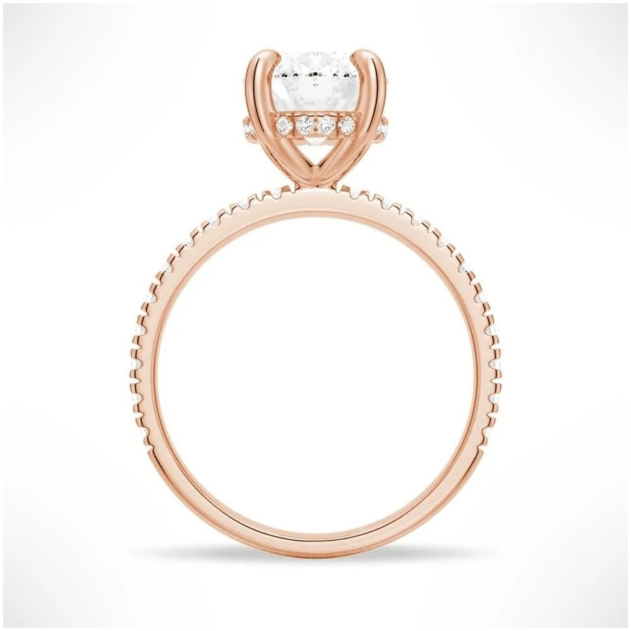 Profile view of Oval Cut Moissanite Engagement Ring with Hidden Halo & Pavé Band and 4 Prong Setting in Rose Gold