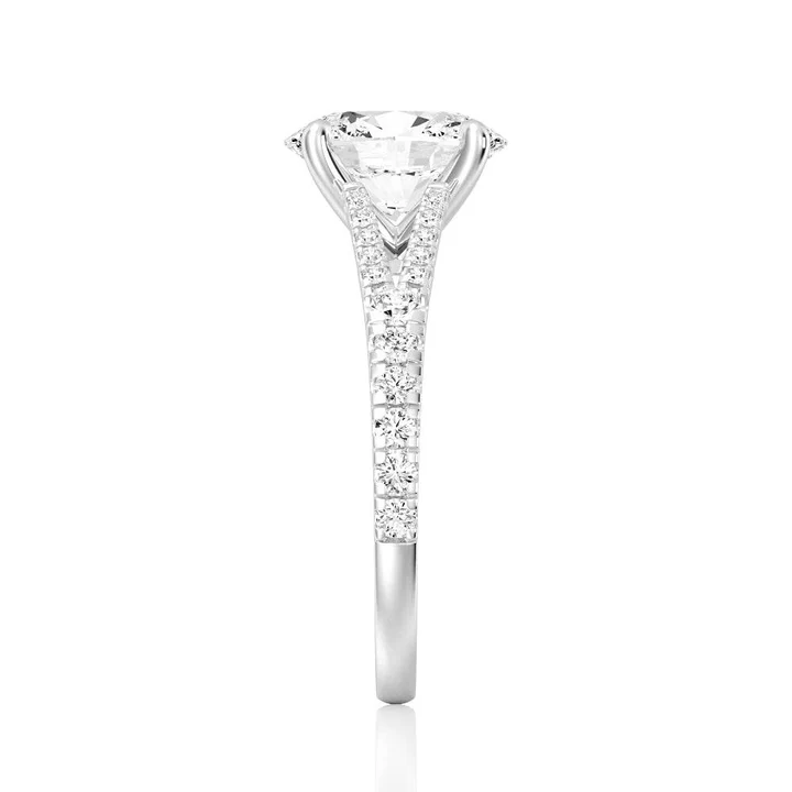Side profile view of Oval Cut Moissanite Engagement Ring with Split Pavé Band in White Gold - Novelle Vow