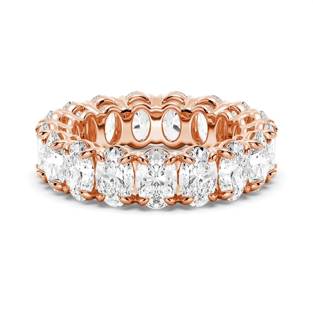 Front view of rose gold oval cut moissanite eternity band