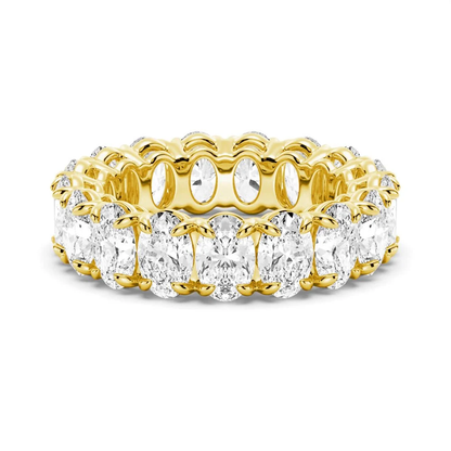 Front view of yellow gold oval cut moissanite eternity ring