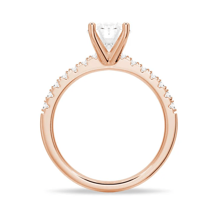 Profile view of Petite Oval Moissanite Engagement Ring with Micropavé Band in Rose Gold