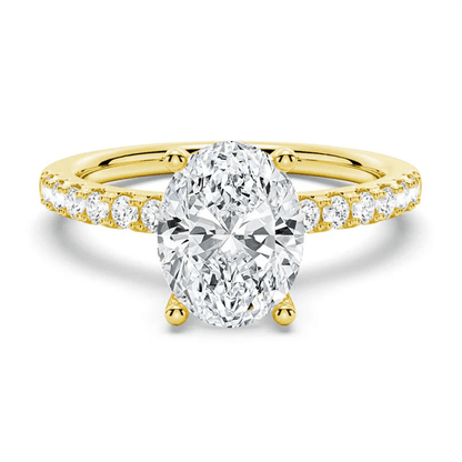 Petite Oval Moissanite Engagement Ring with Micropavé Band in Yellow Gold 