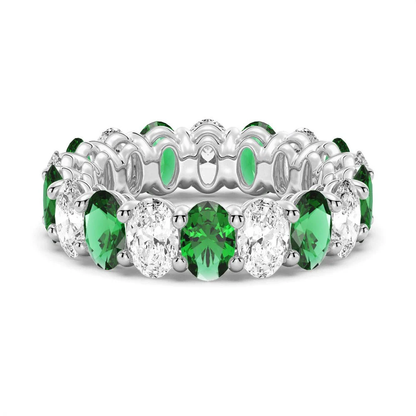 Front view showing alternating emerald green and white sapphire gemstones