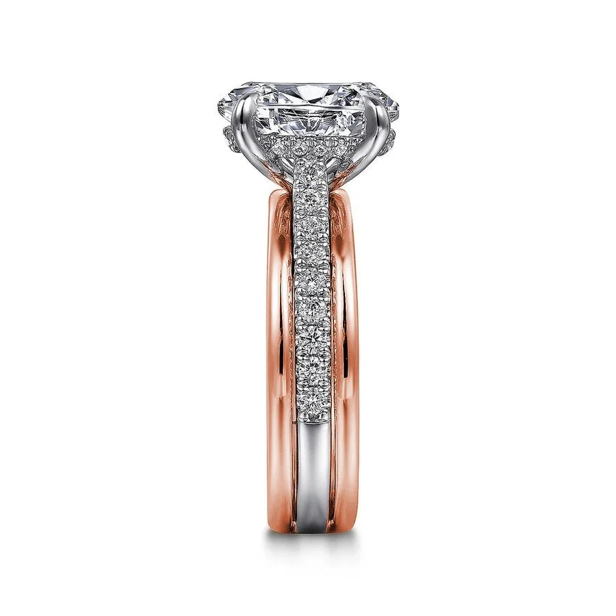 Two-tone rose gold and white gold oval moissanite engagement ring stacked profile view showing pave shank