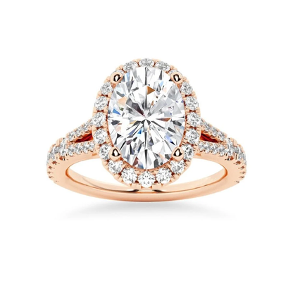 Rose gold oval moissanite engagement ring top view with sparkling halo and pave split shank-Novelle Vow